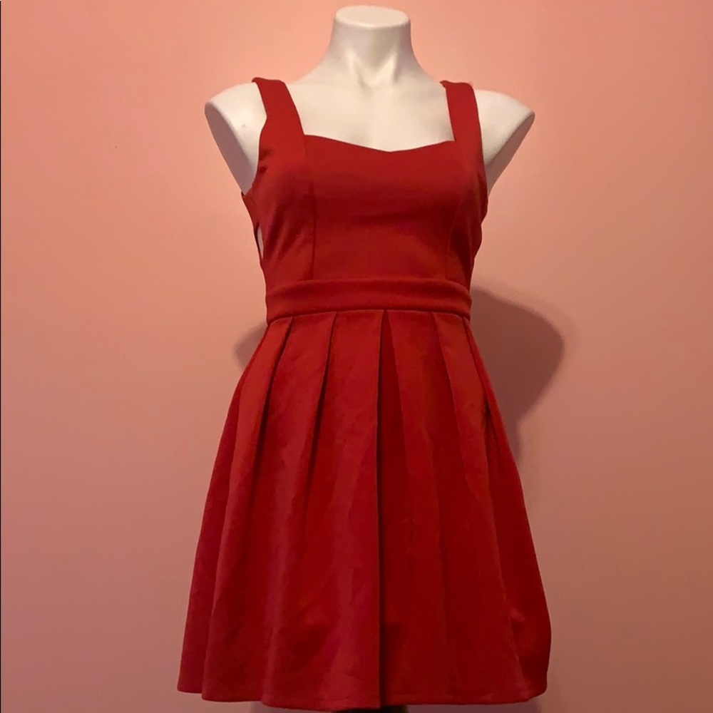 Open back (heart shaped) dress. Never worn.